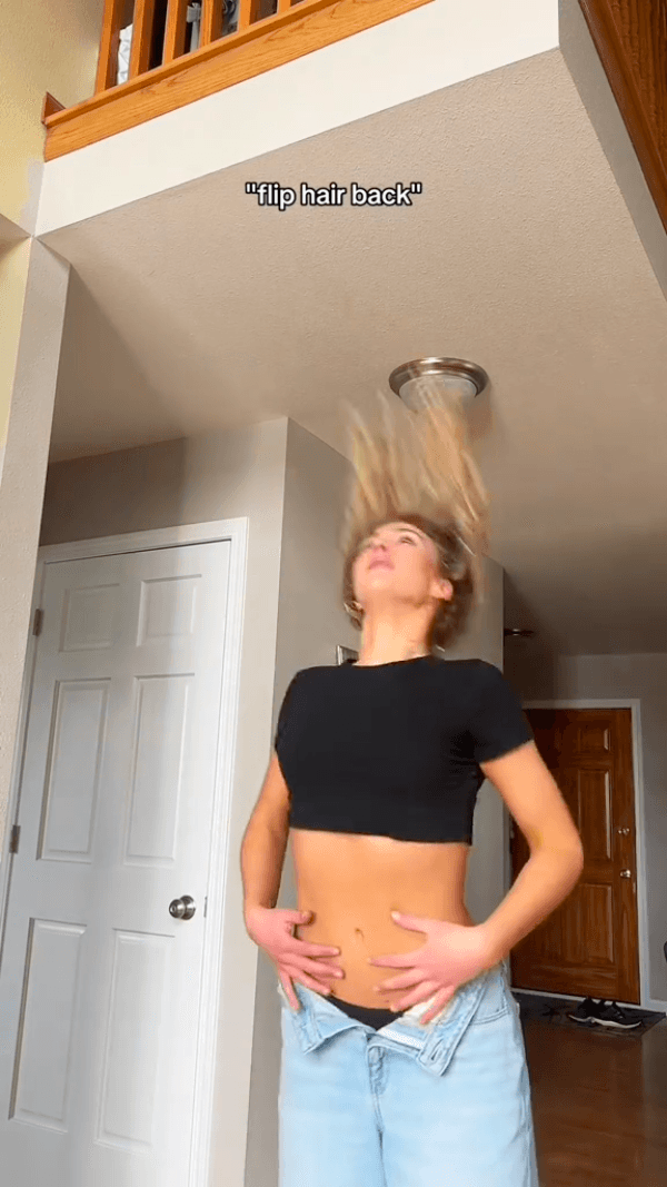 "flip hair back"